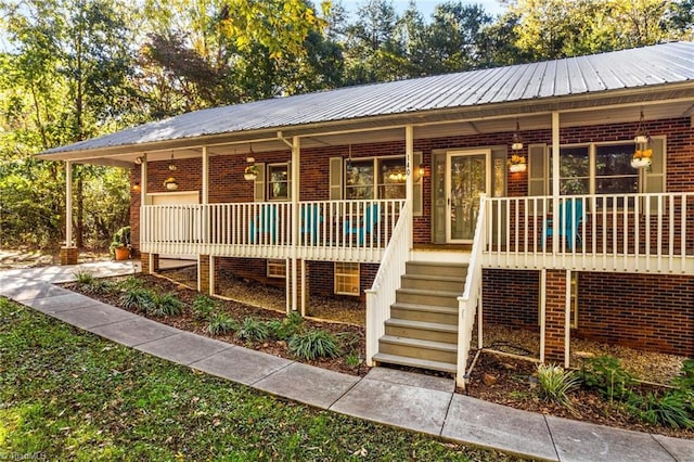 exterior space with a wooden deck and a porch