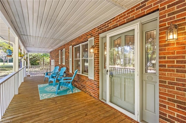 wooden deck featuring a porch