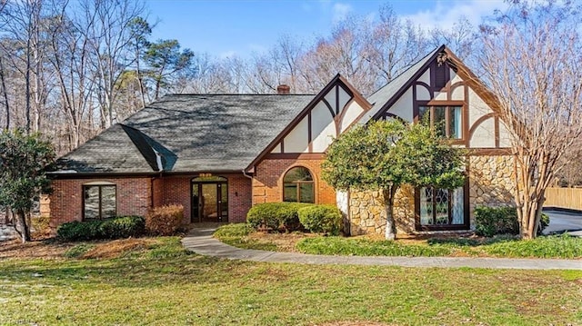 tudor house with a front lawn