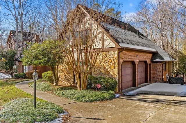 view of property exterior with a garage