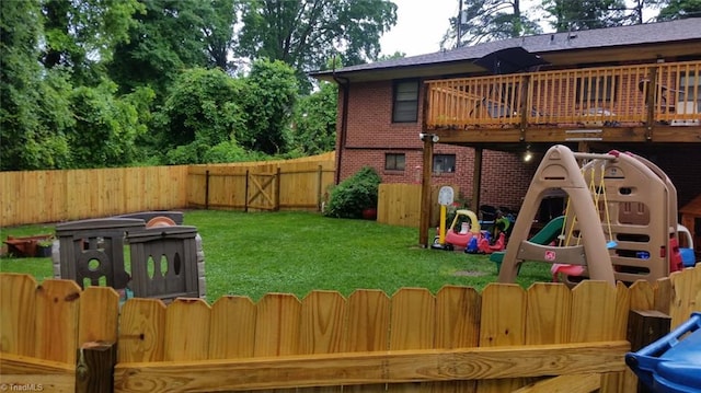 904 Fiske St, Durham, NC 27703 - fenced backyard featuring a deck and a gate