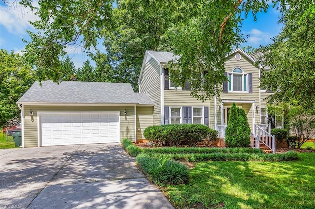 1556 Jubilee Trl, Kernersville, NC 27284 - view of front of house featuring driveway, a garage, and a front yard