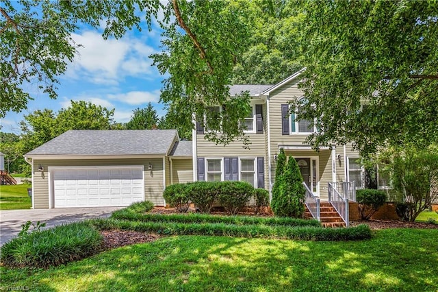 1556 Jubilee Trl, Kernersville, NC 27284 - view of front facade featuring a garage, a front yard, concrete driveway, and a shingled roof