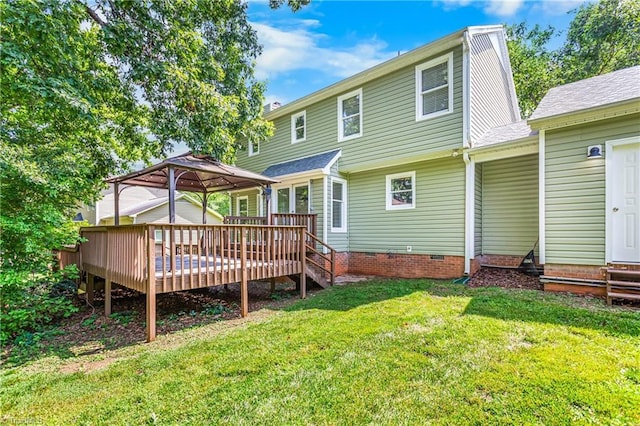 1556 Jubilee Trl, Kernersville, NC 27284 - rear view of house with a wooden deck, a gazebo, a lawn, entry steps, and crawl space