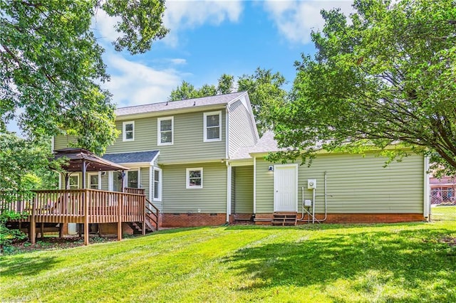 1556 Jubilee Trl, Kernersville, NC 27284 - back of property featuring a deck, crawl space, and a lawn
