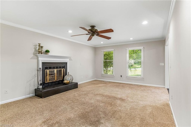1556 Jubilee Trl, Kernersville, NC 27284 - unfurnished living room featuring carpet, ceiling fan, ornamental molding, recessed lighting, and a glass covered fireplace
