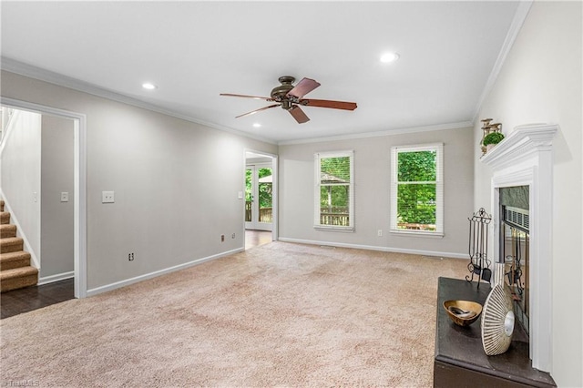 1556 Jubilee Trl, Kernersville, NC 27284 - carpeted living area featuring a ceiling fan, ornamental molding, stairs, recessed lighting, and a high end fireplace