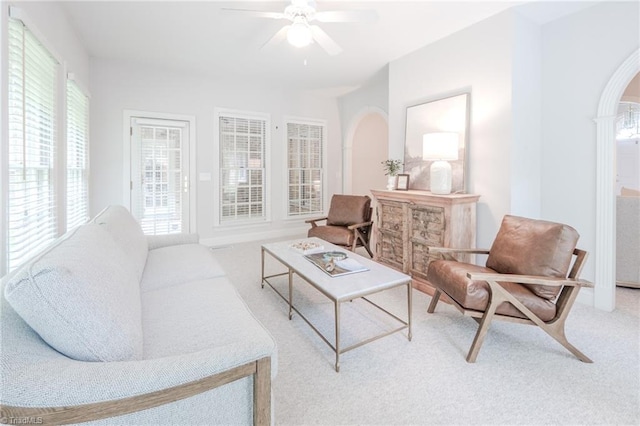 2809 Churchill Ct, High Point, NC 27262 - carpeted living room featuring arched walkways and ceiling fan