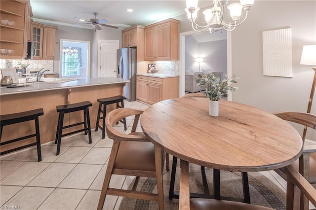2809 Churchill Ct, High Point, NC 27262 - dining room with a chandelier, a ceiling fan, light tile patterned floors, and recessed lighting