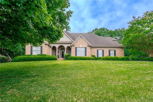 2809 Churchill Ct, High Point, NC 27262 - view of front of house featuring a front lawn and brick siding
