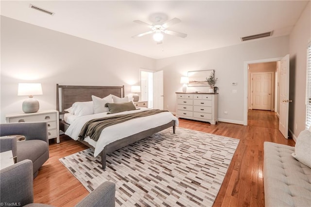 2809 Churchill Ct, High Point, NC 27262 - bedroom with light wood finished floors, a ceiling fan, and baseboards