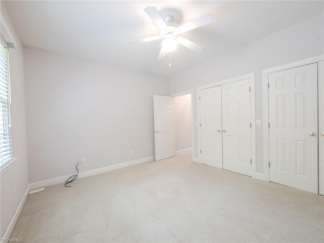 2809 Churchill Ct, High Point, NC 27262 - unfurnished bedroom featuring light colored carpet, baseboards, a ceiling fan, and a closet