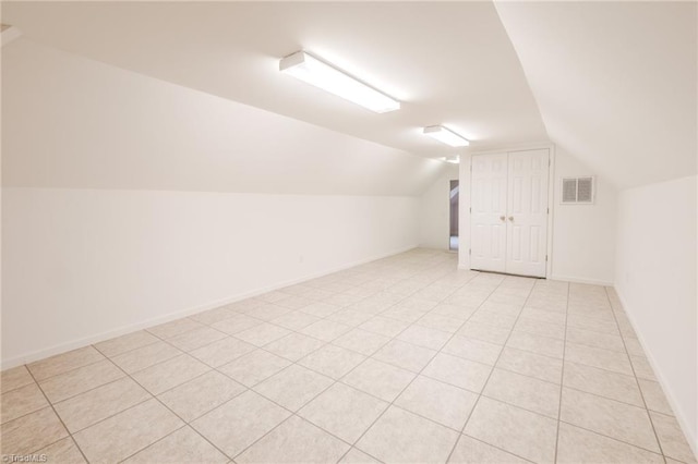 2809 Churchill Ct, High Point, NC 27262 - additional living space featuring vaulted ceiling and baseboards