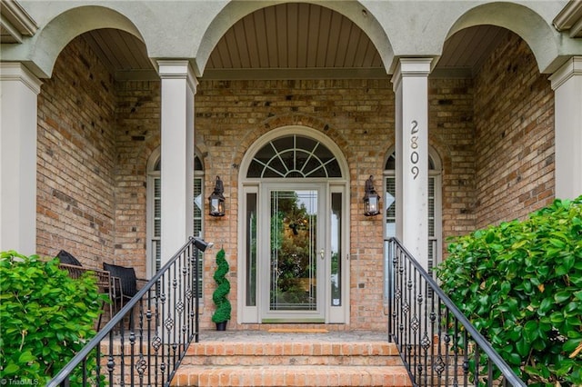 2809 Churchill Ct, High Point, NC 27262 - doorway to property featuring brick siding and covered porch