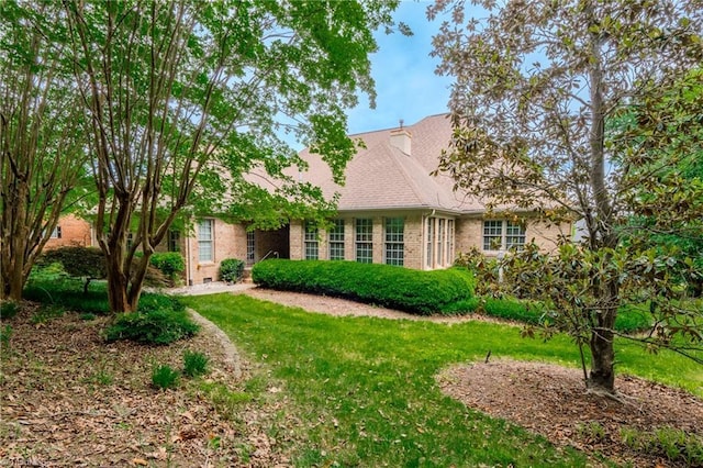 2809 Churchill Ct, High Point, NC 27262 - view of front facade featuring brick siding, a front lawn, and roof with shingles