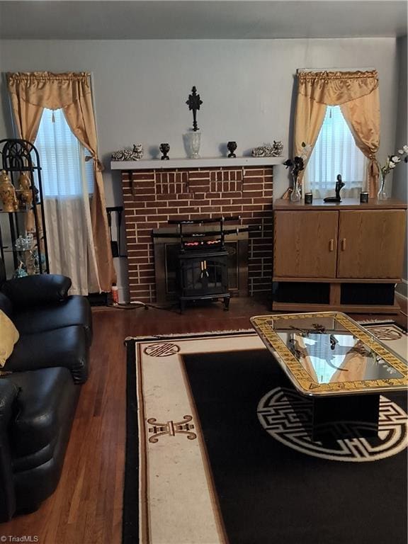 living room with a wood stove