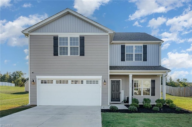 view of front of house with a garage and a front yard