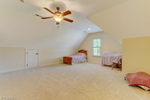 bedroom with baseboards, carpet floors, a ceiling fan, and vaulted ceiling