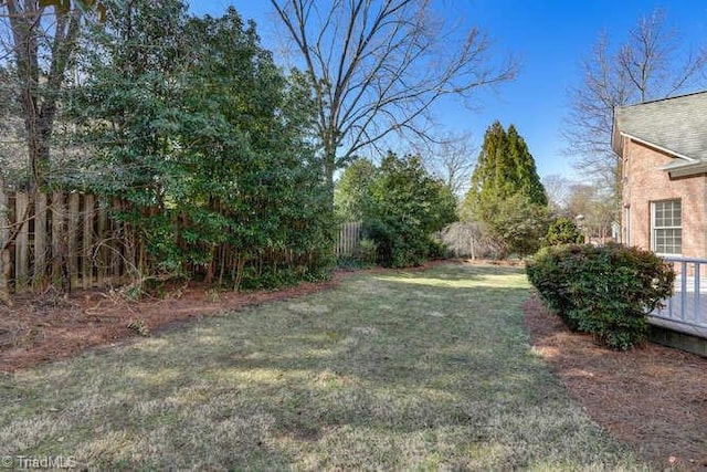 view of yard featuring fence