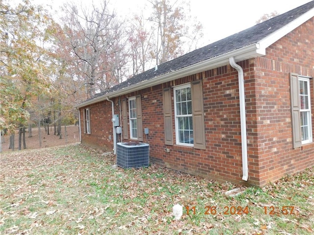 view of property exterior with central air condition unit