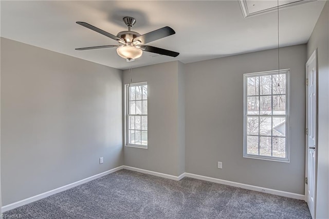 unfurnished room with ceiling fan, a healthy amount of sunlight, and carpet floors