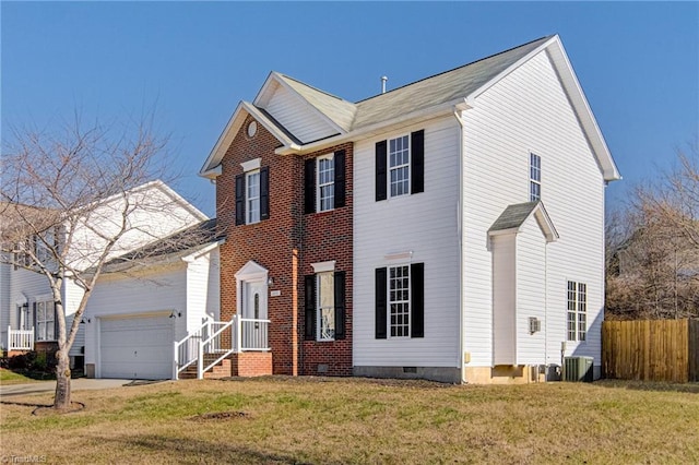 view of front of home featuring central AC, a front lawn, and a garage