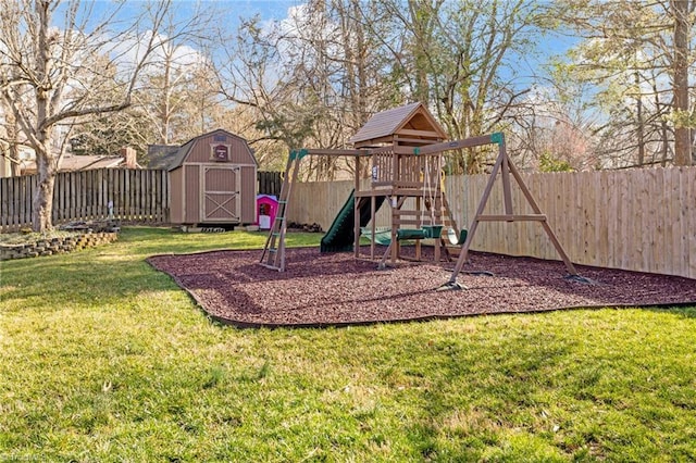 view of playground with a storage shed and a lawn