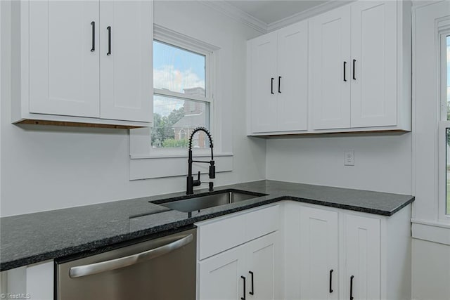 408 N Maple St, Graham, NC 27253 - kitchen featuring stainless steel dishwasher, a sink, white cabinetry, and crown molding