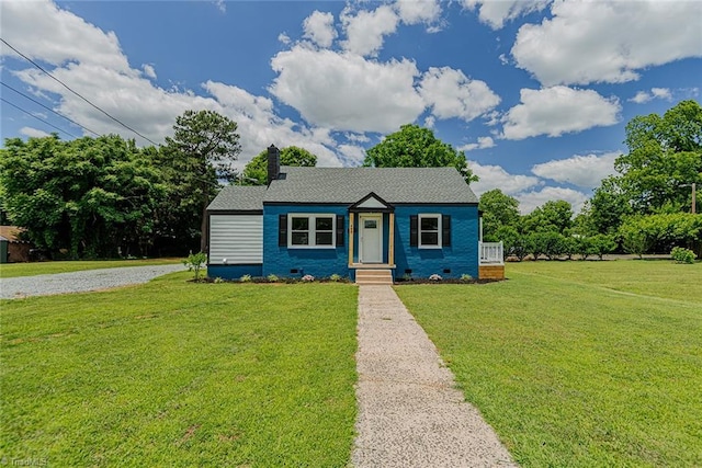 408 N Maple St, Graham, NC 27253 - bungalow featuring crawl space, a front lawn, and a chimney