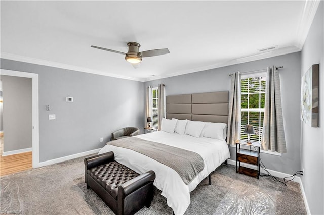 bedroom with crown molding and ceiling fan