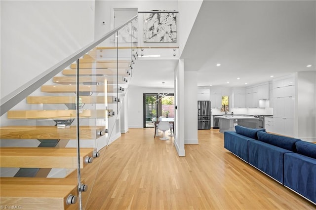 foyer entrance with light hardwood / wood-style flooring