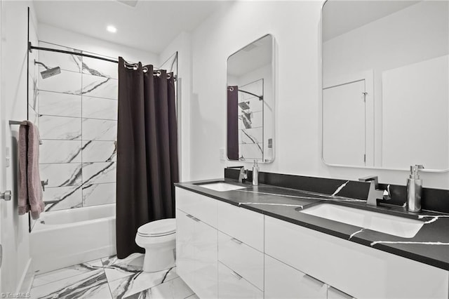 full bathroom featuring vanity, shower / bath combo with shower curtain, and toilet