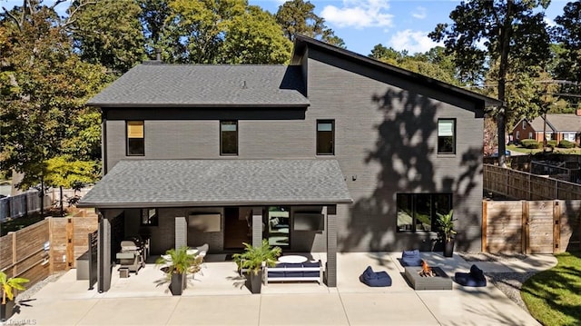 rear view of property with a patio