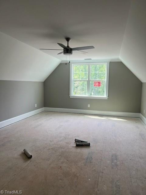 bonus room with vaulted ceiling and ceiling fan