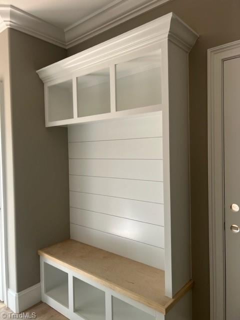 mudroom featuring crown molding