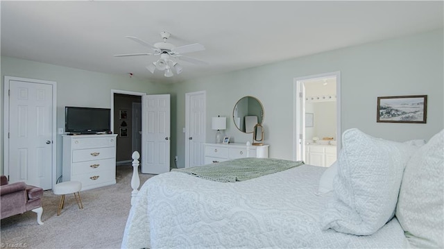 bedroom featuring ceiling fan, carpet flooring, and connected bathroom