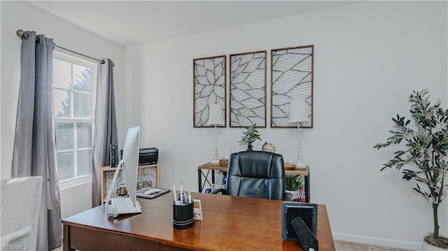 office area featuring baseboards