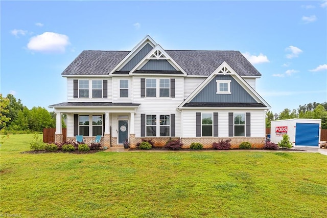 130 Laced Maple Ct, Reidsville, NC 27320 - craftsman house with brick siding, a front yard, and board and batten siding