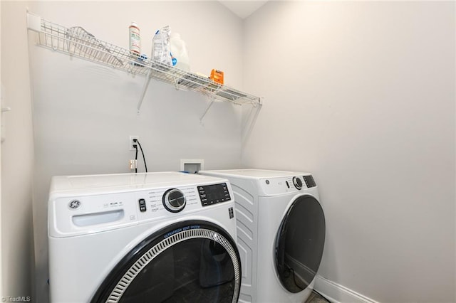 1117 Magenta Way, Kernersville, NC 27284 - washroom with washing machine and dryer and baseboards