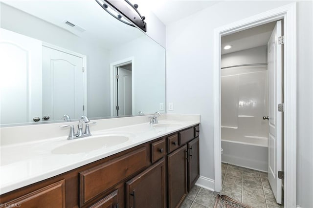 1117 Magenta Way, Kernersville, NC 27284 - bathroom with double vanity, toilet, shower / washtub combination, and baseboards
