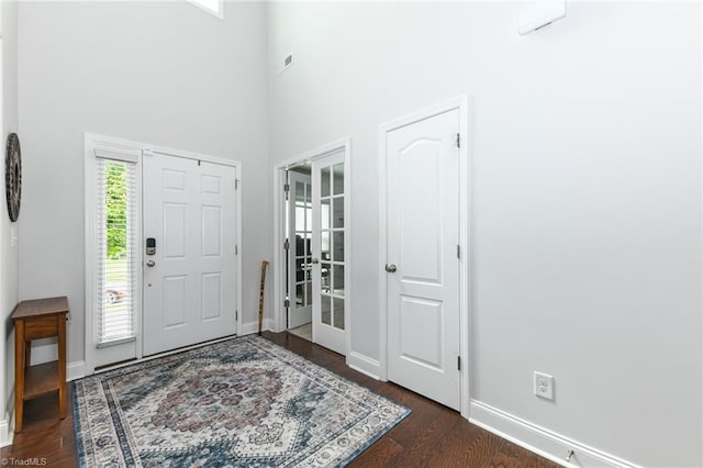 1117 Magenta Way, Kernersville, NC 27284 - foyer with french doors, baseboards, a towering ceiling, and dark wood-type flooring