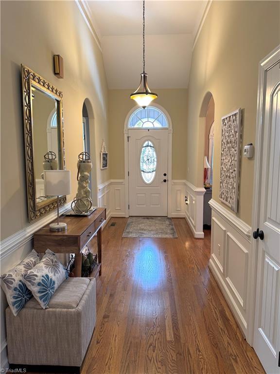 entrance foyer with dark hardwood / wood-style flooring