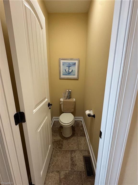 bathroom featuring toilet