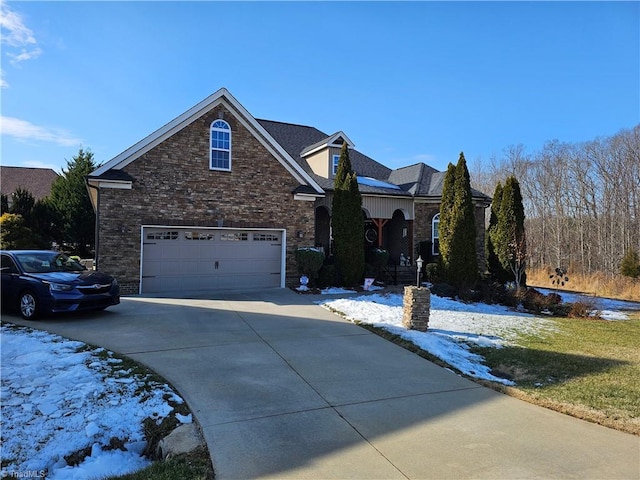 front of property with a garage