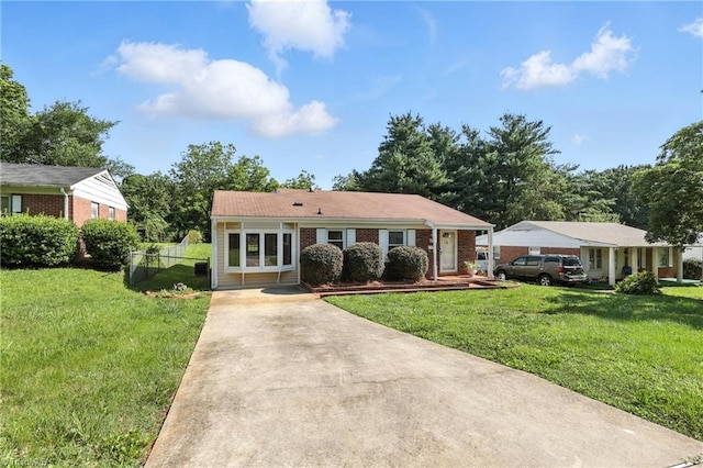 827 Woodcote Dr, Winston-Salem, NC 27107 - ranch-style house featuring concrete driveway and brick siding