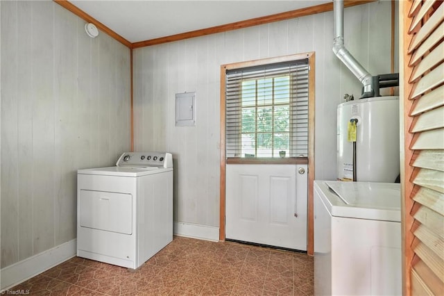 827 Woodcote Dr, Winston-Salem, NC 27107 - laundry area with water heater, tile patterned floors, crown molding, wooden walls, and washing machine and clothes dryer