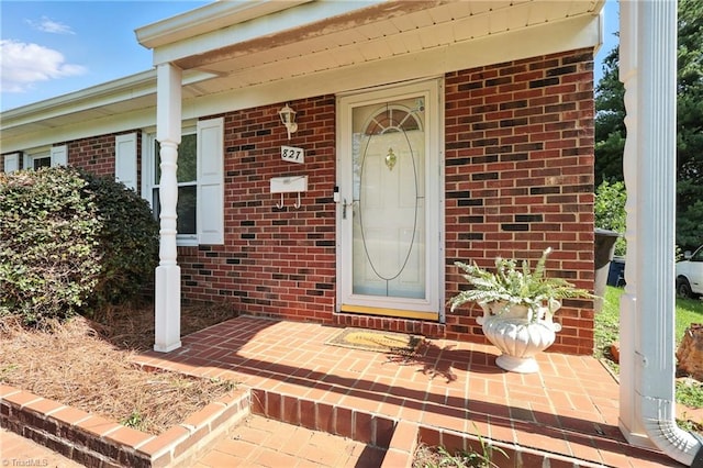 827 Woodcote Dr, Winston-Salem, NC 27107 - entrance to property featuring brick siding and a porch