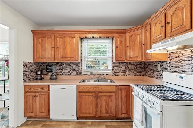 827 Woodcote Dr, Winston-Salem, NC 27107 - kitchen with white appliances, under cabinet range hood, light countertops, and tasteful backsplash