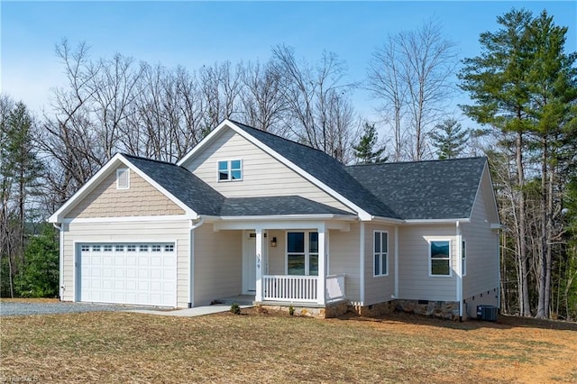 view of front of house featuring gravel driveway, a porch, a front yard, crawl space, and an attached garage