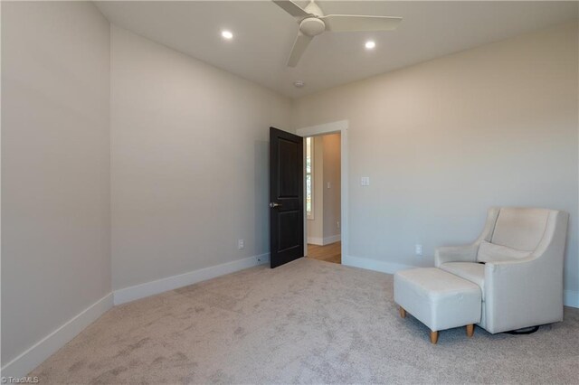 sitting room with recessed lighting, a ceiling fan, baseboards, and carpet floors